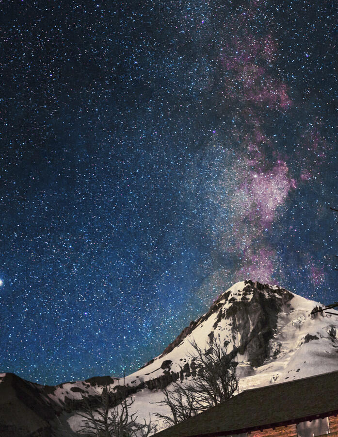 Pink-purple Milky Way over a snow peak